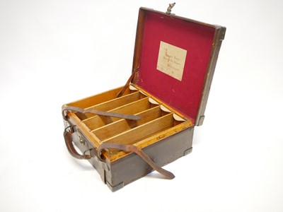Lot 496 - Oak and leather cartridge magazine by Wanless...