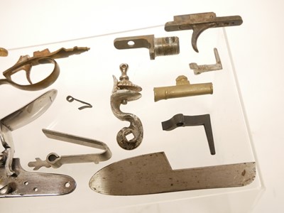 Lot 342 - Collection of muzzle loader gun lock parts