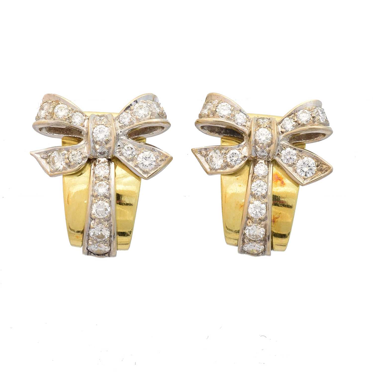 Lot A pair of 18ct gold diamond earrings retailed by Boodles