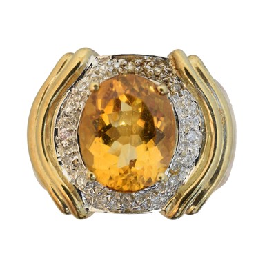 Lot 100 - A 9ct gold citrine and diamond cluster ring