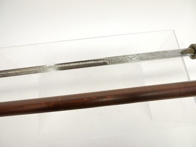 Lot 101 - Sword stick, with cane scabbard and embossed...