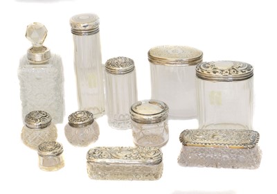 Lot 155 - A selection of silver lidded jars