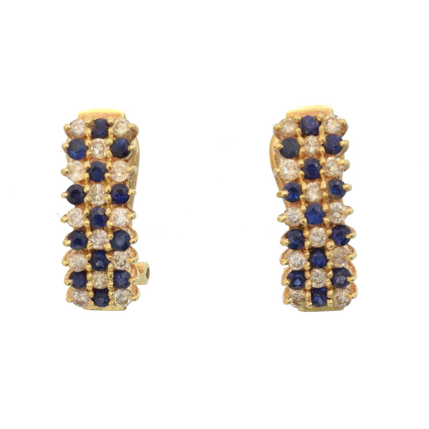Lot A pair of sapphire and diamond earrings