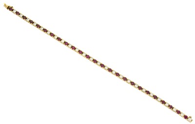 Lot 19 - A ruby and diamond line bracelet