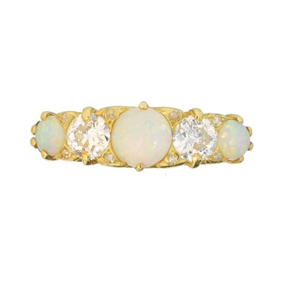 Lot 116 - An opal and diamond dress ring