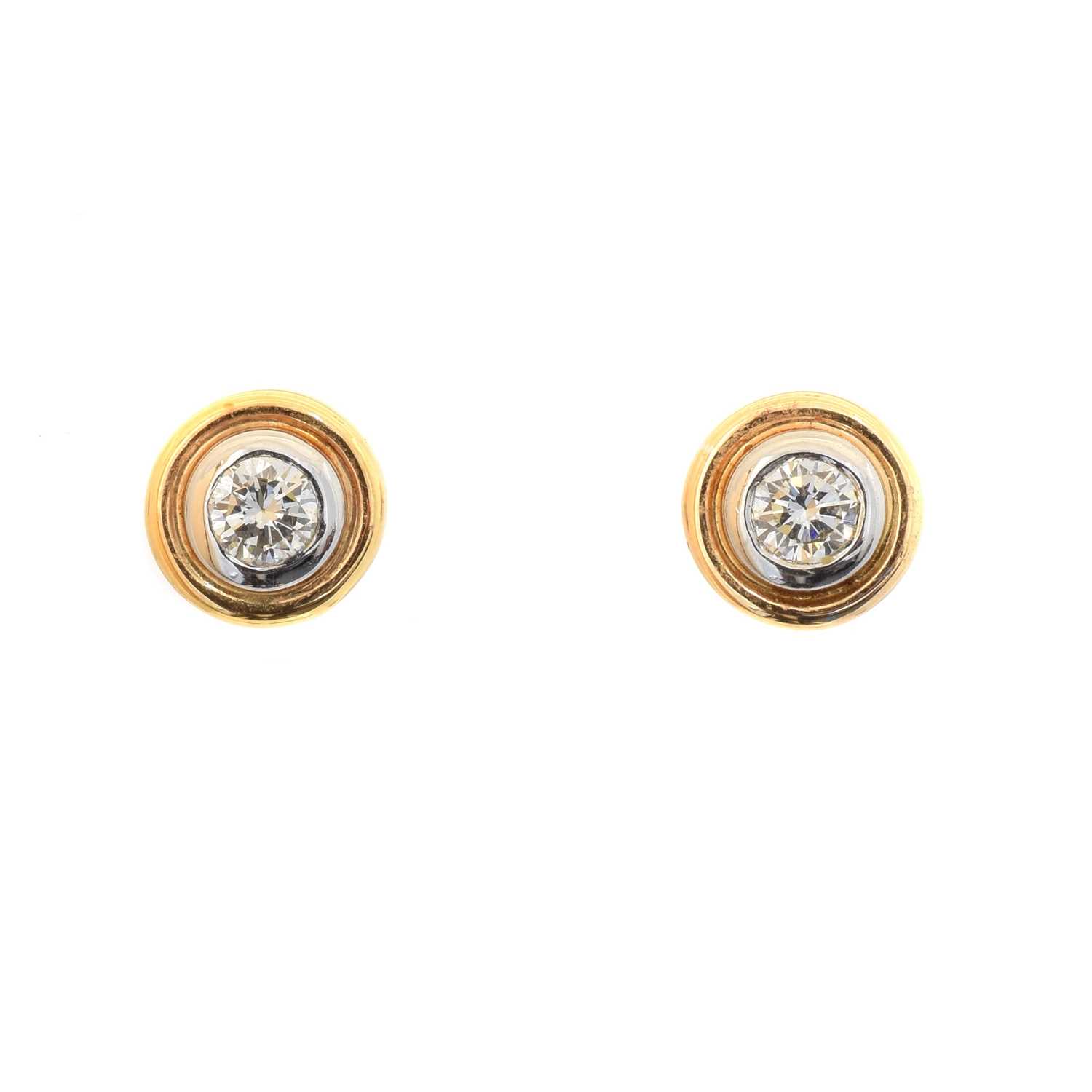 Lot 35 - A pair of brilliant cut diamond stud earrings