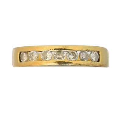 Lot 106 - An 18ct gold diamond band ring