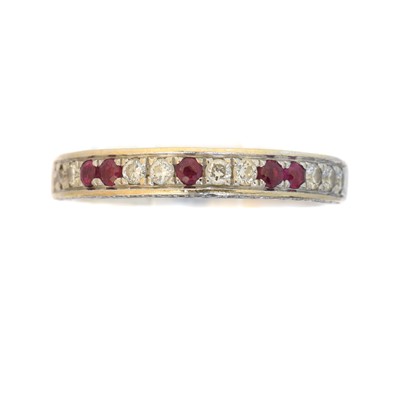Lot 44 - An 18ct gold diamond and ruby band ring