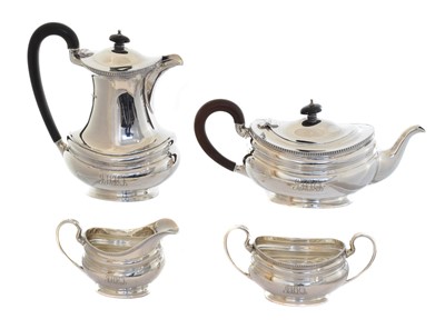 Lot 148 - A George V silver four piece tea set