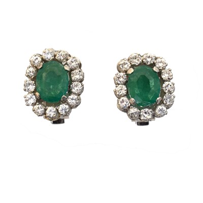Lot 36 - A pair of emerald and diamond clip earrings