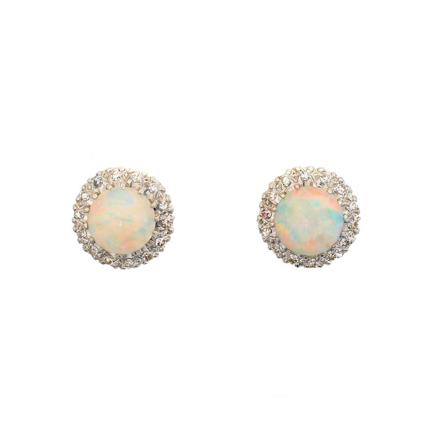 Lot 37 - A pair of opal and diamond earrings