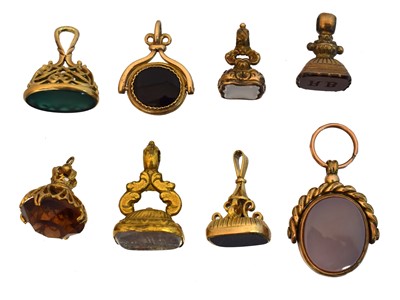Lot 150 - A selection of gold and gold plated fobs