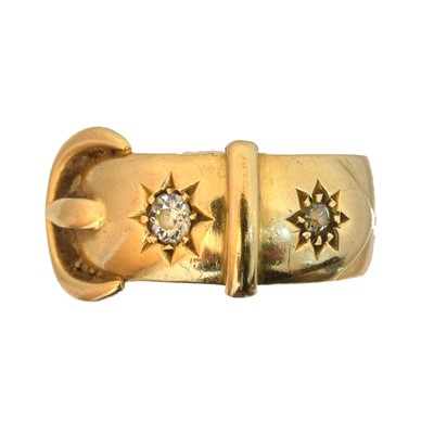Lot 102 - An early 20th century 18ct gold diamond buckle ring