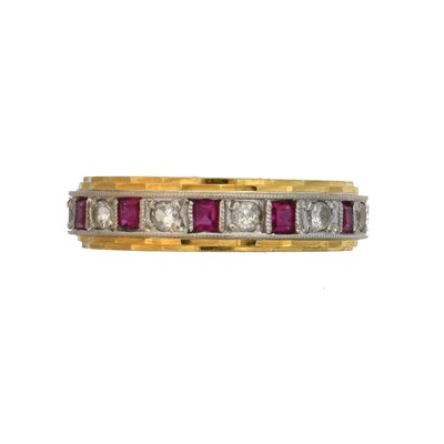 Lot 46 - An 18ct gold synthetic ruby and paste eternity ring