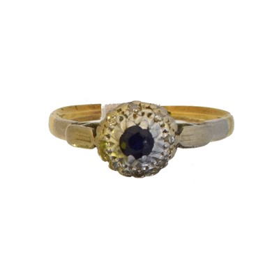 Lot 67 - A sapphire and diamond cluster ring