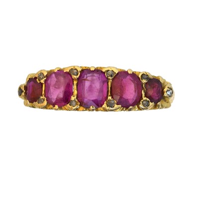 Lot 94 - A ruby and diamond five stone ring