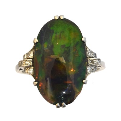Lot 113 - An early 20th century black opal and diamond dress ring