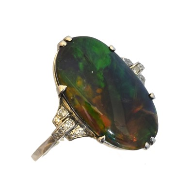 Lot 113 - An early 20th century black opal and diamond dress ring