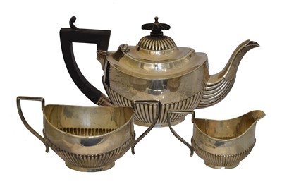 Lot 134 - An Edward VII silver three piece tea set