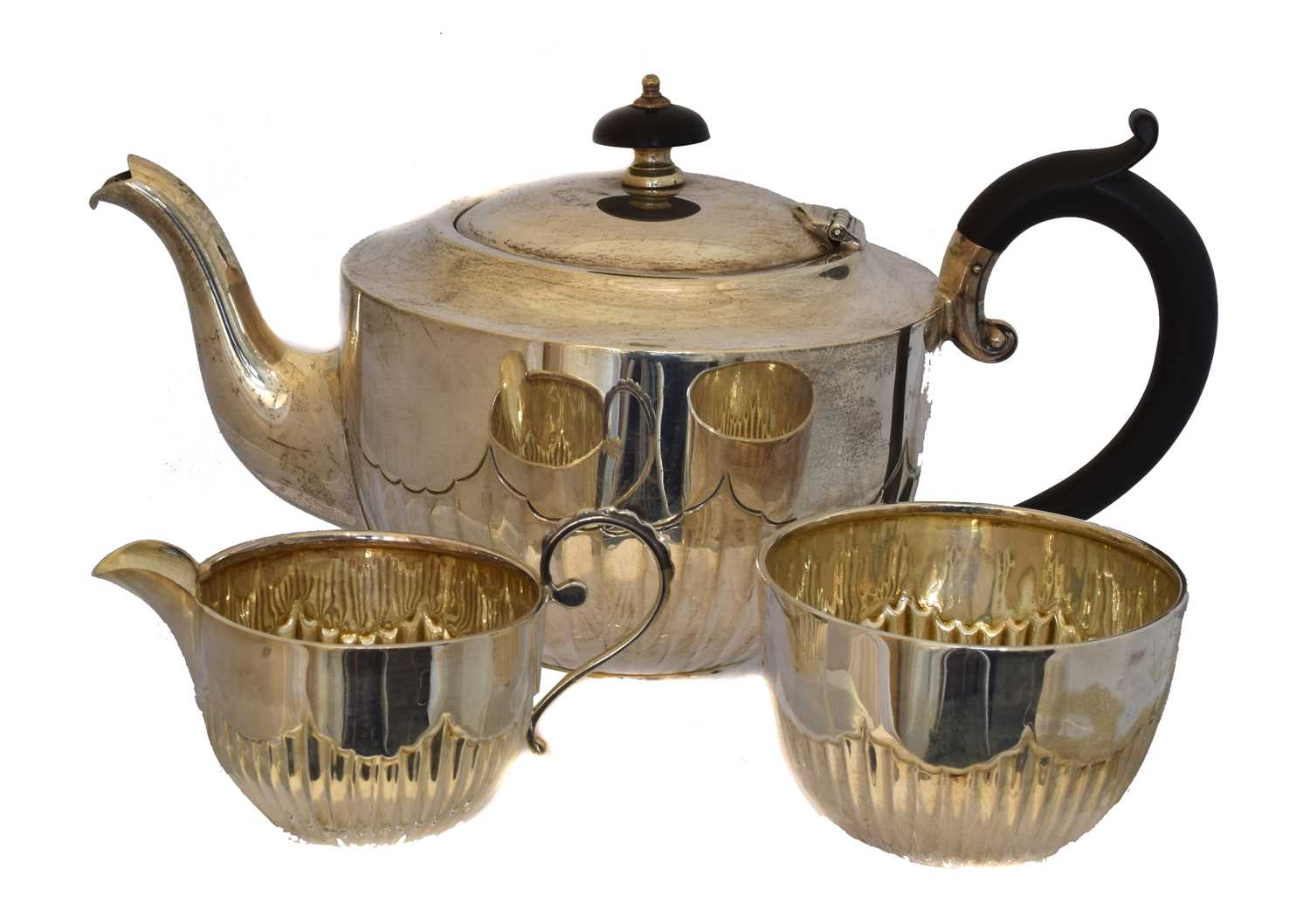 Lot 175 - A silver three piece tea set