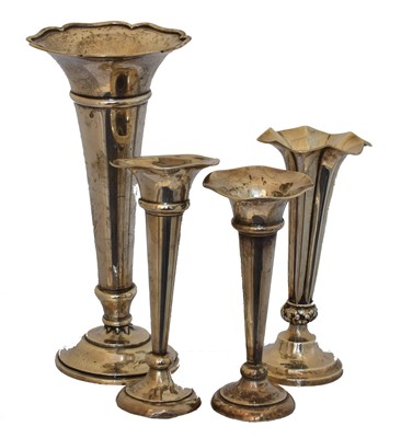 Lot 135 - Four silver trumpet vases
