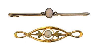 Lot Two early 20th century 15ct gold opal bar brooches.