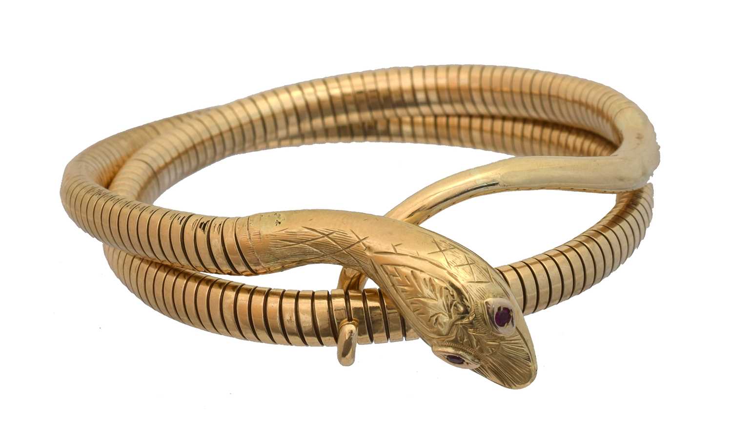 Lot 38 - A 9ct gold snake bracelet by Cropp & Farr.
