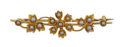 Lot 3 - An early 20th century split pearl bar brooch.