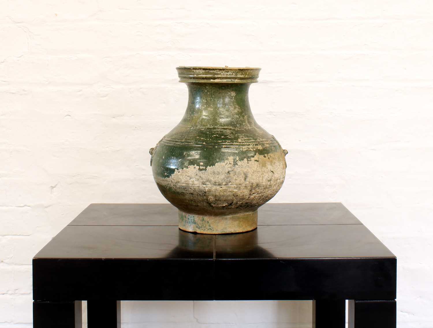 Lot 21 - A Large Chinese Eastern Han Dynasty Pottery "Hu" Vase