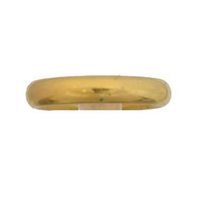 Lot 54 - A 22ct gold band ring.