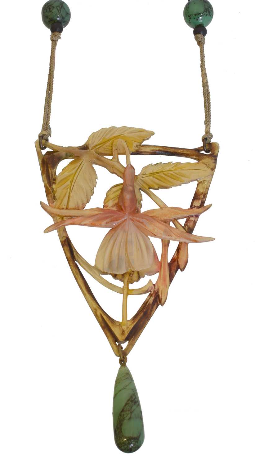 77 - An Art Nouveau carved horn necklace, attributed to Elizabeth Bonté.