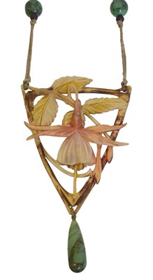 Lot 77 - An Art Nouveau carved horn necklace, attributed to Elizabeth Bonté.
