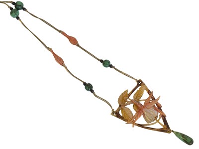 Lot 77 - An Art Nouveau carved horn necklace, attributed to Elizabeth Bonté.