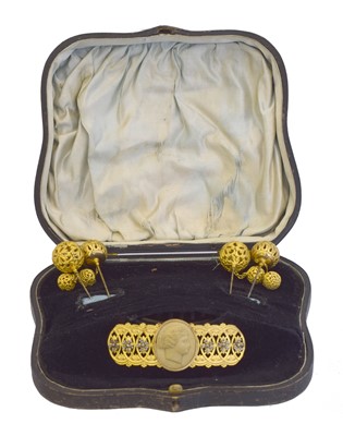 Lot 172 - A late Victorian lava cameo gilt comb and set of hair pins.