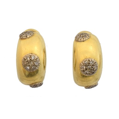 Lot 50 - A pair of diamond hoop earrings.