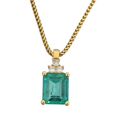 Lot An emerald and diamond pendant.