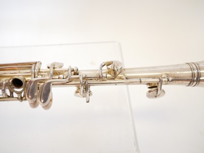 Lot 233 - H.N. White and Co. The Gladiator silver plated all metal clarinet