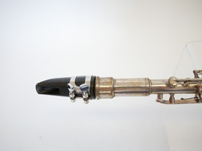 Lot 233 - H.N. White and Co. The Gladiator silver plated all metal clarinet