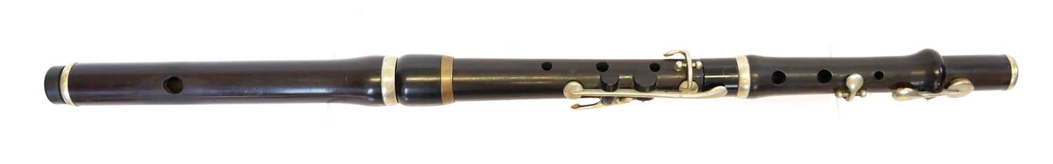 Lot 235 - Rosewood flute by Henry Potter of London