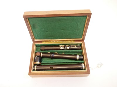 Lot 235 - Rosewood flute by Henry Potter of London