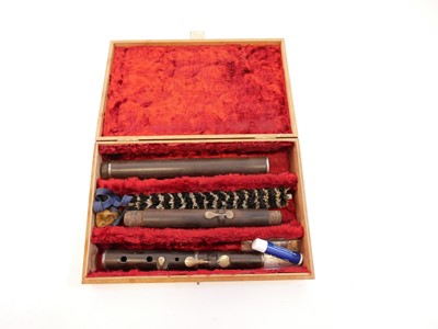 Lot 236 - Rosewood flute by G.W. Bonn