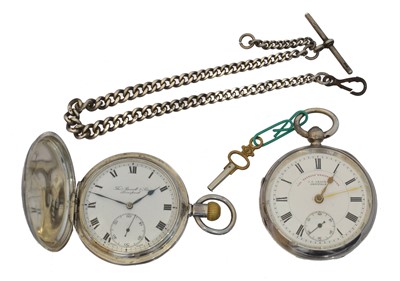 Lot 136 - Two silver pocket watches and an Albert chain.
