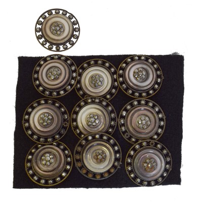 Lot 168 - A set of ten 19th century mother of pearl and cut steel buttons.