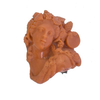 Lot 15 - A 19th century carved coral brooch.