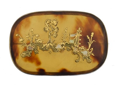 Lot 10 - A Chinese inlaid tortoiseshell brooch.