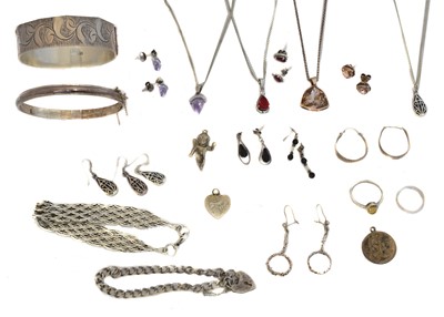 Lot 114 - A selection of silver and white metal jewellery.