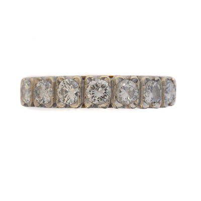 Lot 150 - An 18ct gold diamond seven stone ring.