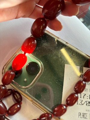 Lot 89 - A cherry bakelite necklace.
