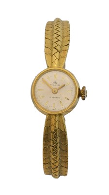 Lot 180 - An 18ct gold ladies Bucherer manual wind wristwatch.