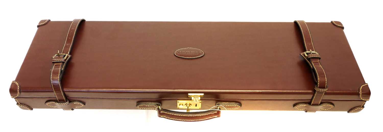 Lot 497 - New unused Guardian leather shotgun case, with...